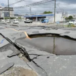 japan earthquake, a road collapse