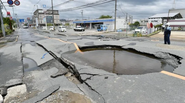 japan earthquake, a road collapse